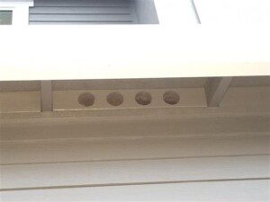 Soffit vents provide intake air for ventilating the attic space.