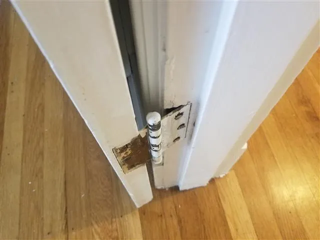 loose door hinge