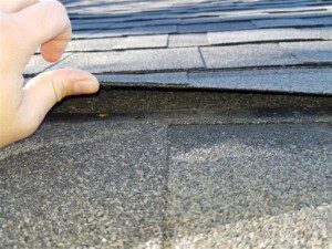 Why do asphalt shingles need to be bonded?