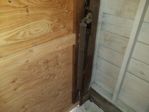 Missing containment cable for garage door